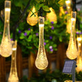 Guirnalda de luces LED solares en forma de gota para exteriores, impermeables, para jardín, césped, caminos, vallas, bodas, fiestas y decoración navideña.