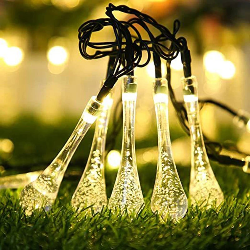Guirnalda de luces LED solares en forma de gota para exteriores, impermeables, para jardín, césped, caminos, vallas, bodas, fiestas y decoración navideña.