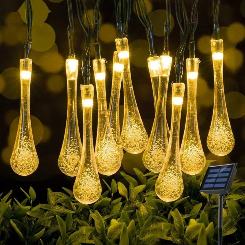 Guirnalda de luces LED solares en forma de gota para exteriores, impermeables, para jardín, césped, caminos, vallas, bodas, fiestas y decoración navideña.